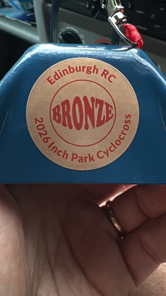Bronze cowbell trophy from the Edinburgh RC 2026 Inch Park Cyclocross